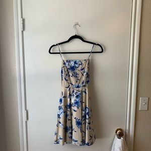 Cream colored dress with blue floral details